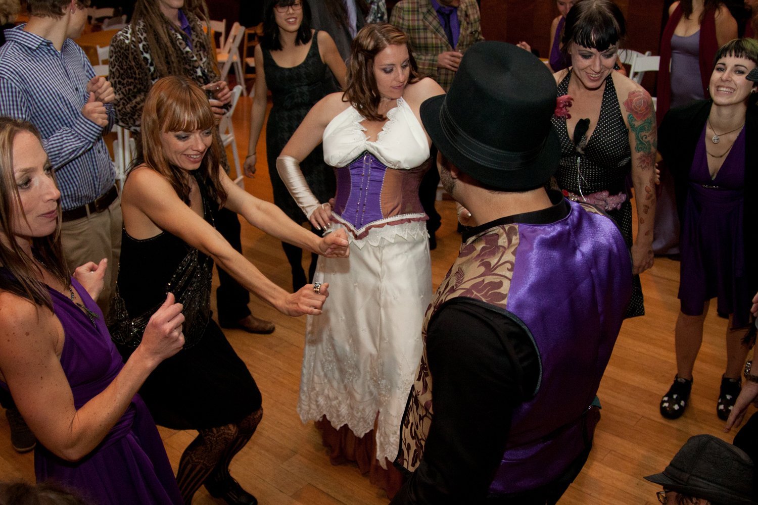 Guests dancing in costume at a party